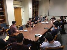 Group in a classroom listening to Dr. Linda S. Birnbaum's seminar.