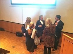 Professors chatting in a conference room