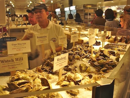 Man standing near Oyster Bar.