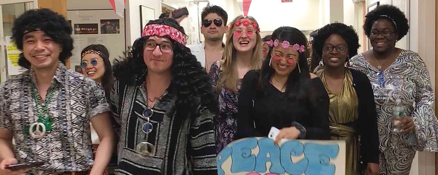 Group dressed as hippies.