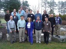 Group of students standing outdoors.