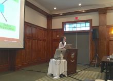 Presenter at a conference.