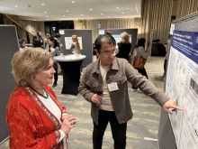 Dr Gudas and Chenge at the Poster Session