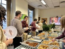 Our guests enjoying the delicious indian food at the holiday event!
