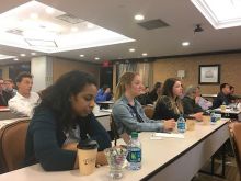 Students listening to retreat speaker.