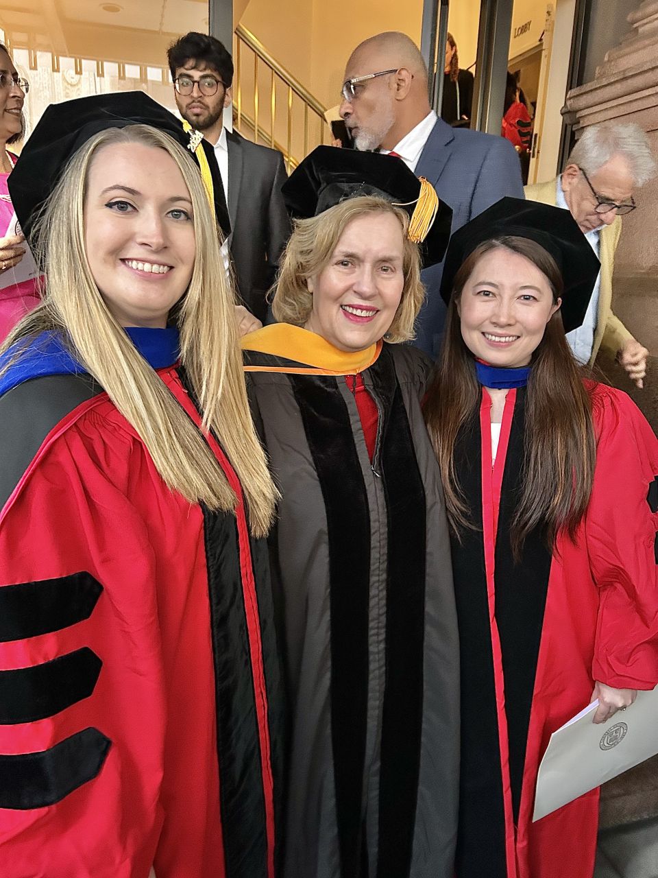 Graduate Krysta Dikun, Dr. Gudas and Graduate Shelley Bai