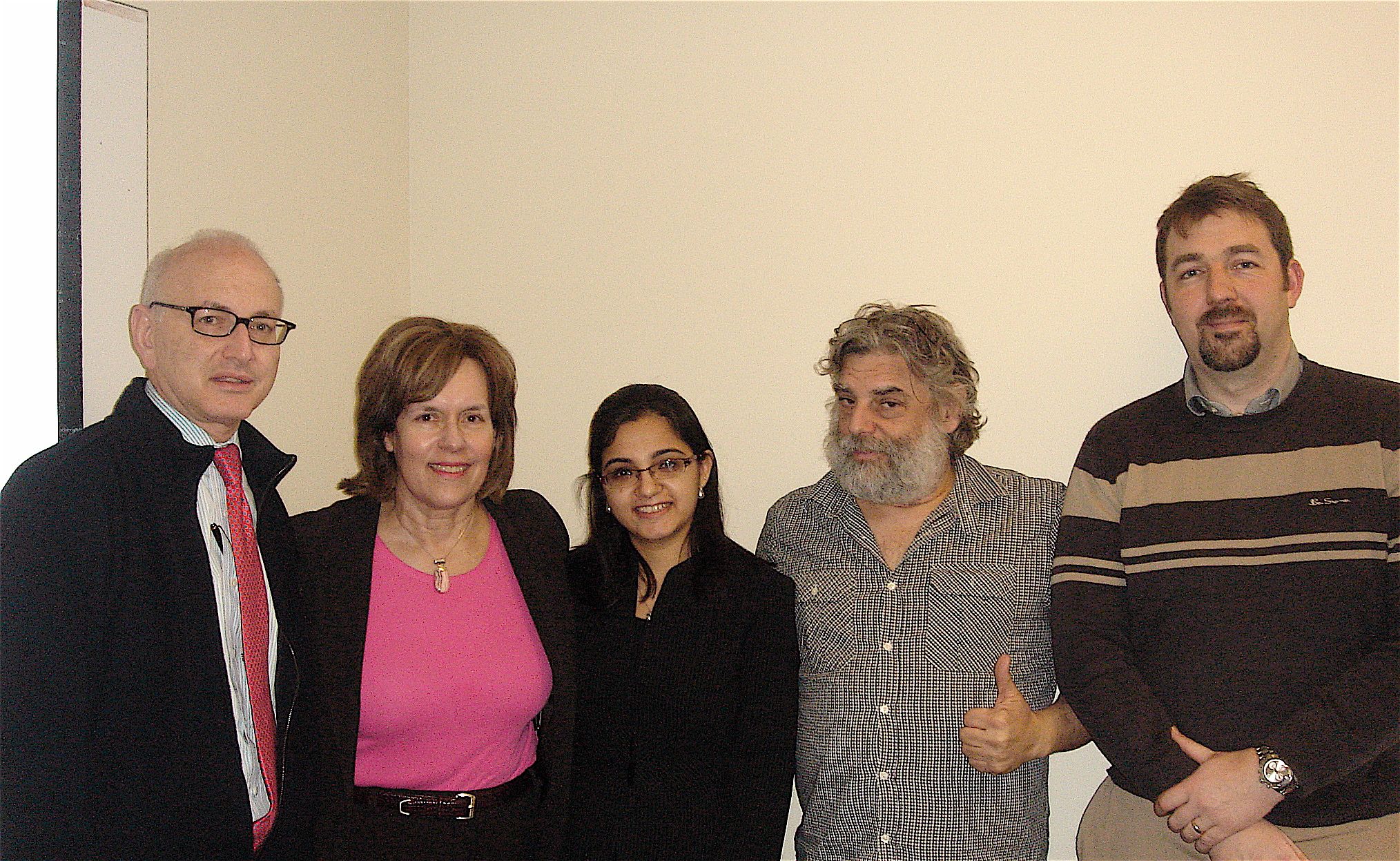 Vasundhra in the middle surrounded by (l to r) her thesis committee members Dr. Steve Nimer; Dr. Lorraine Gudas, Vasundhra's thesis advisor; Dr. Steve Gross; and Dr. Geoff Abbott.