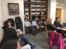 Trainees sitting in library.