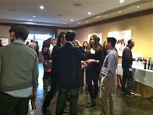 Postdocs mingling at event.