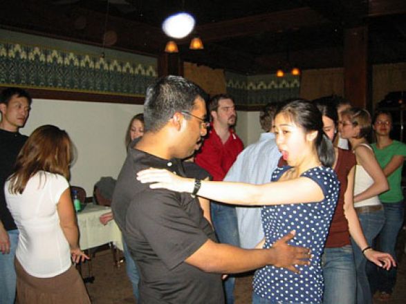 Students dancing at a party.