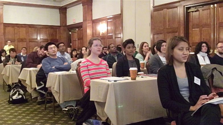 Audience watching presenters.