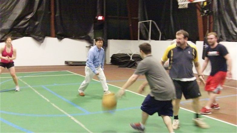 Students playing game indoors.