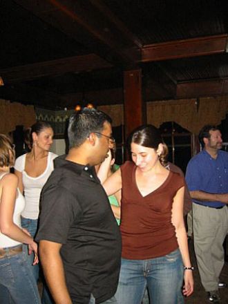 Students dancing at a party.