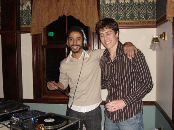 Students socializing at a party. Students socializing at a party.