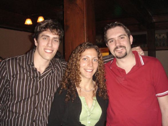 Students socializing at a party. Students socializing at a party.