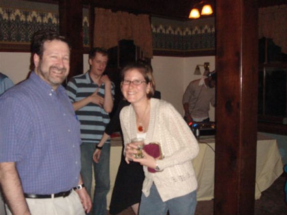 Students socializing at a party. Students socializing at a party.