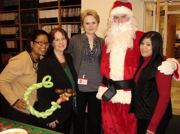 Kerry Victor, Chris Conti, Olga R. Willis, Santa (Chris Kelly), and Lissett Checo