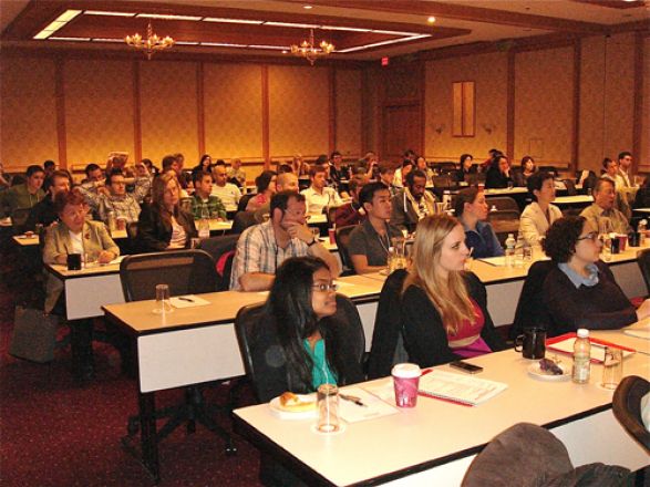 Audience watching presenters.