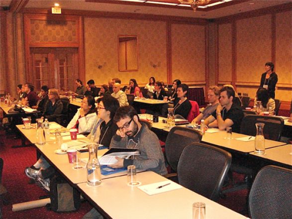 Audience watching presenters. Audience watching presenters.