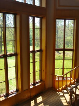 Window overlooking a giant field.