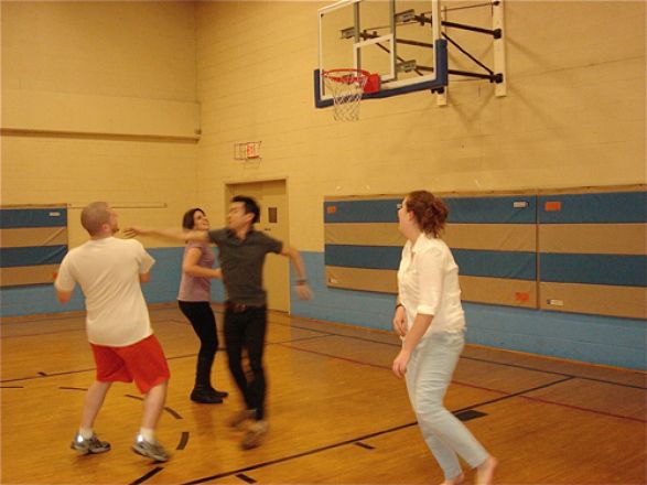 Group playing basketball. Group playing basketball.