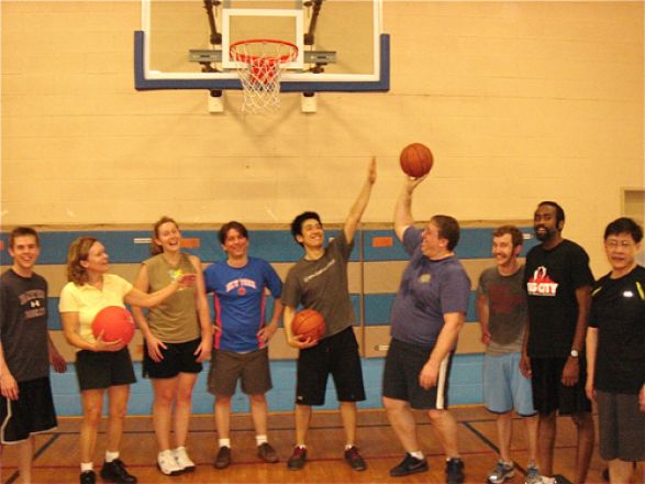 Group playing basketball.