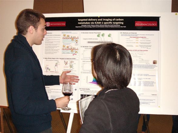 Alex Veach at his poster Alex Veach at his poster