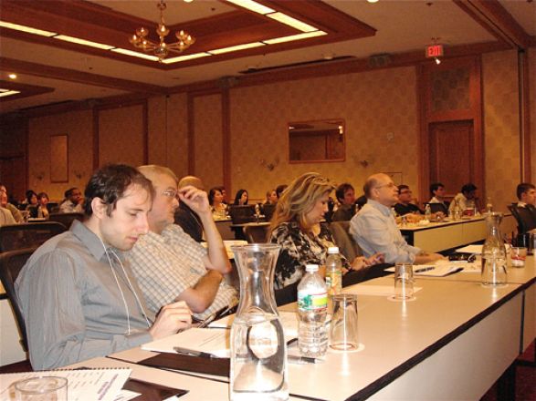 Audience watching presenters.