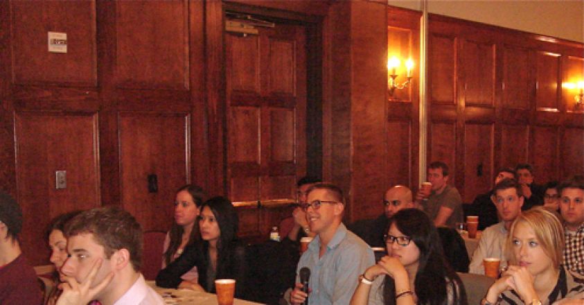 Audience watching presenters.