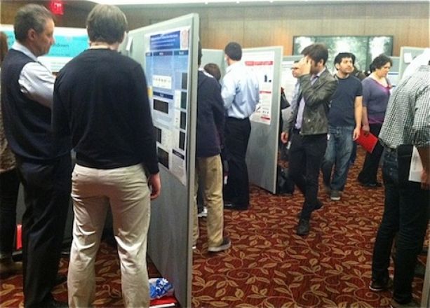 Students browse presentations at the Vigneaud Symposium.