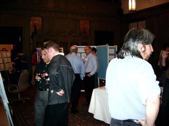 Students browsing poster boards.