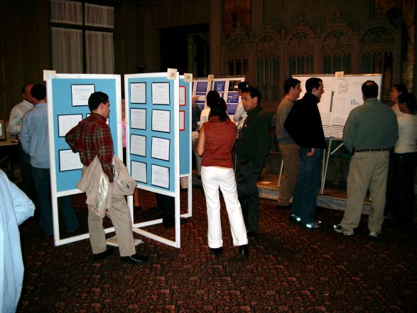 Students browsing poster boards.