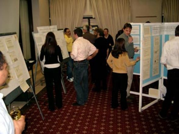 Students browsing poster boards.