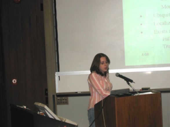 Presenter at a conference.