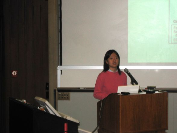 Presenter at a conference.