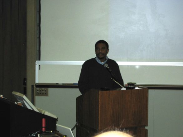 Presenter at a conference.