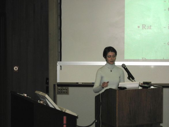 Presenter at a conference.