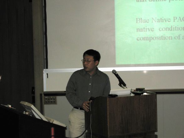 Presenter at a conference.