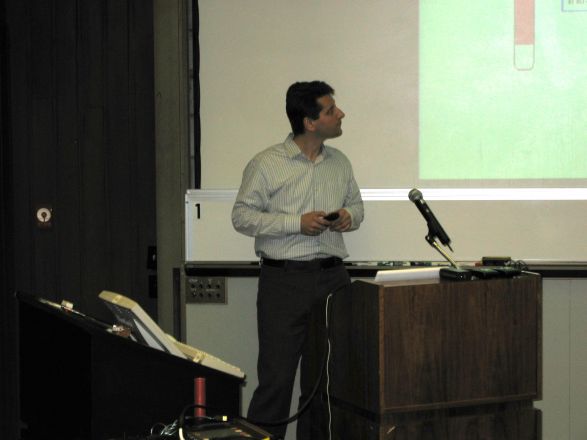 Presenter at a conference. Presenter at a conference.