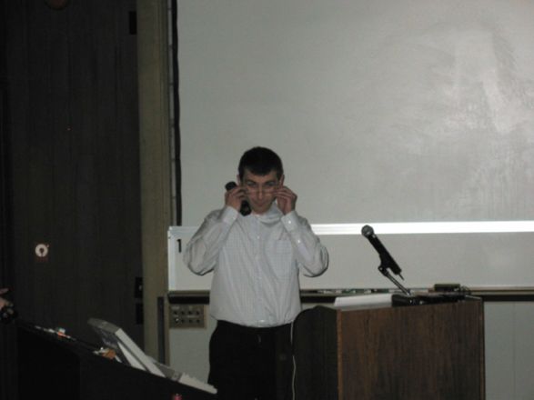 Presenter at a conference.