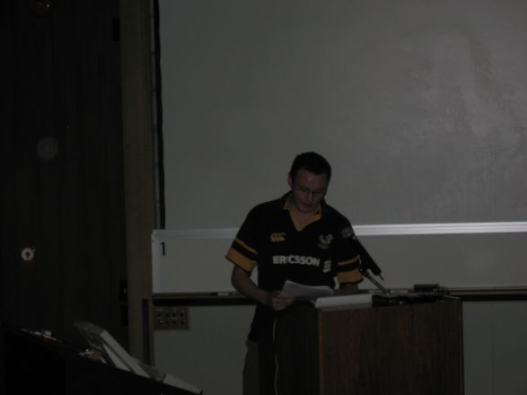 Presenter at a conference. Presenter at a conference.