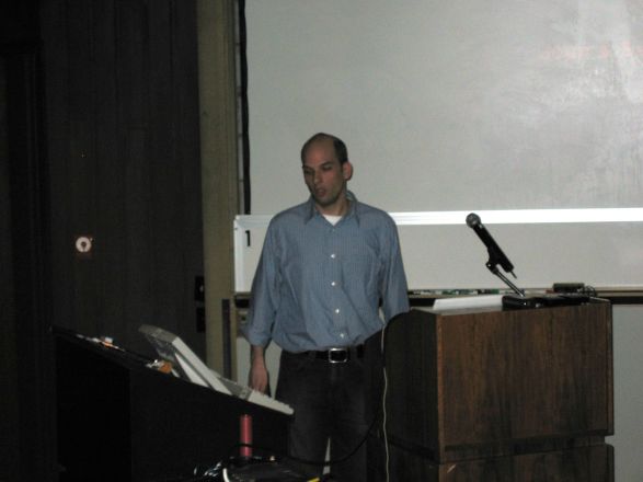 Presenter at a conference.