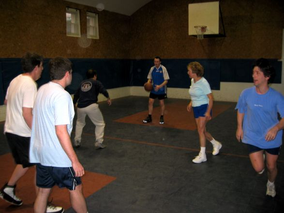 Students playing basketball.