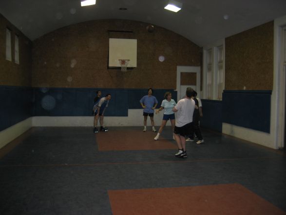 Students playing basketball.