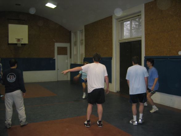 Students playing basketball.