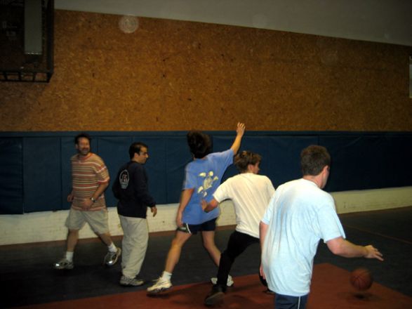 Students playing basketball.