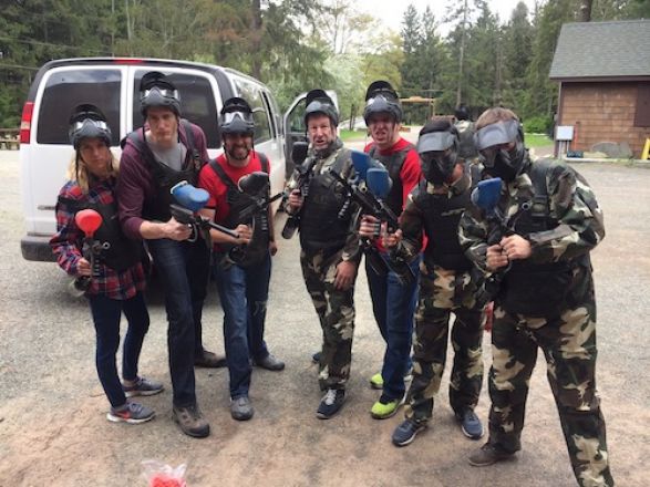 Group in paintball gear.