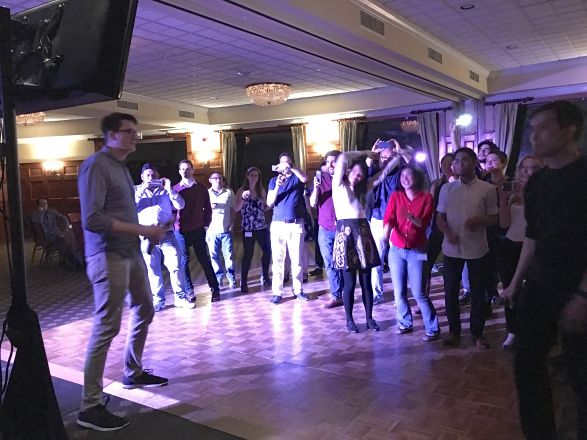 Students dancing at a party. Students dancing at a party.