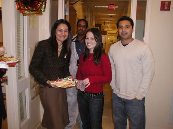 Students and faculty enjoy Holiday Party 2004.