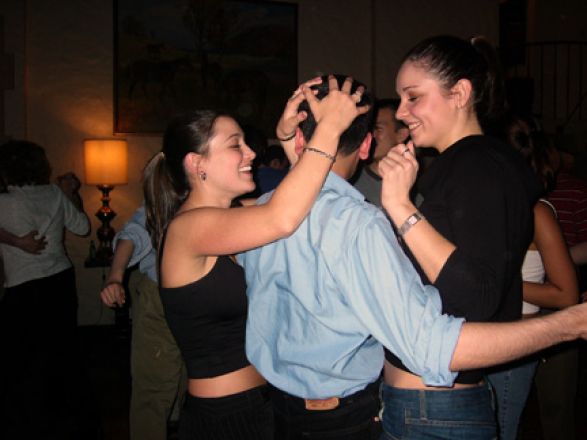 Students dancing at a party.